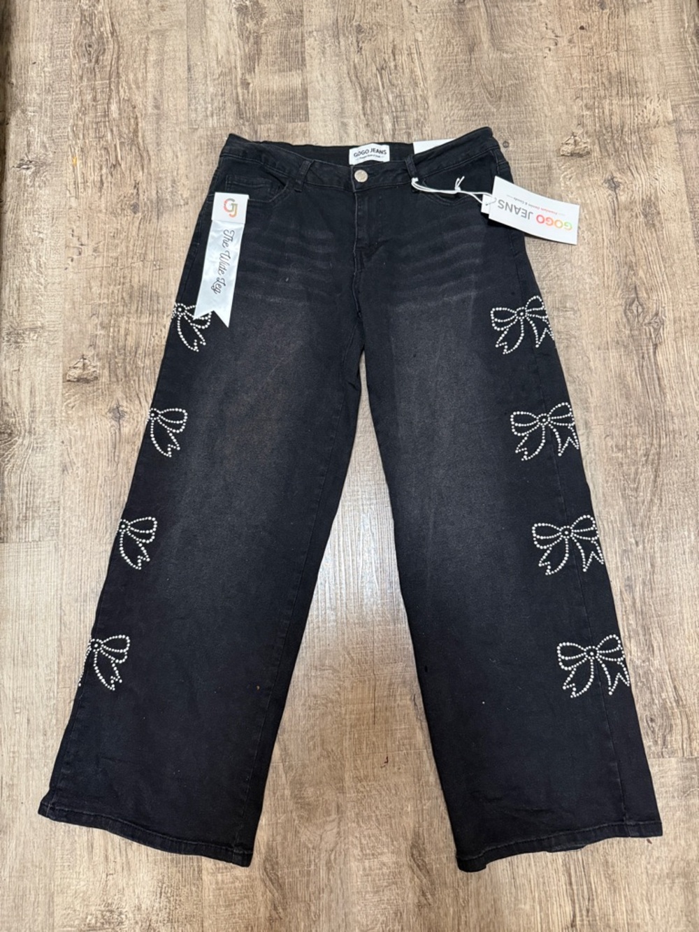 Juniors Black Wide Leg Jeans with Rhinestone Bow Detail
